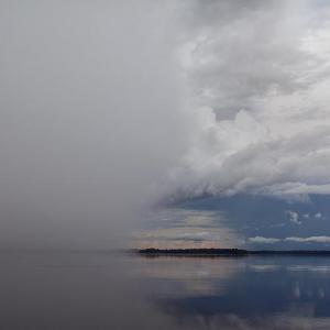 Storm brewing over the Rio Negro, Amazon, Brazil by Carolyn Monastra